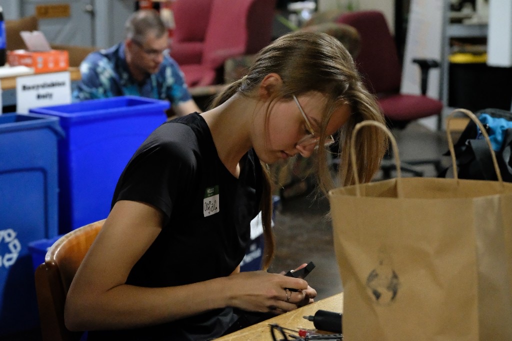 A maker focused on a project at the workbench